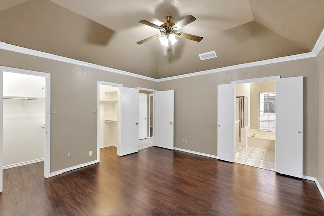208 Lydia Cir, Irving, TX 75060 - unfurnished bedroom with a spacious closet, high vaulted ceiling, wood finished floors, a ceiling fan, and ensuite bath
