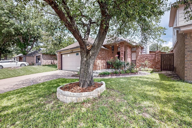 208 Lydia Cir, Irving, TX 75060 - view of front of home with brick siding, concrete driveway, a gate, and a garage
