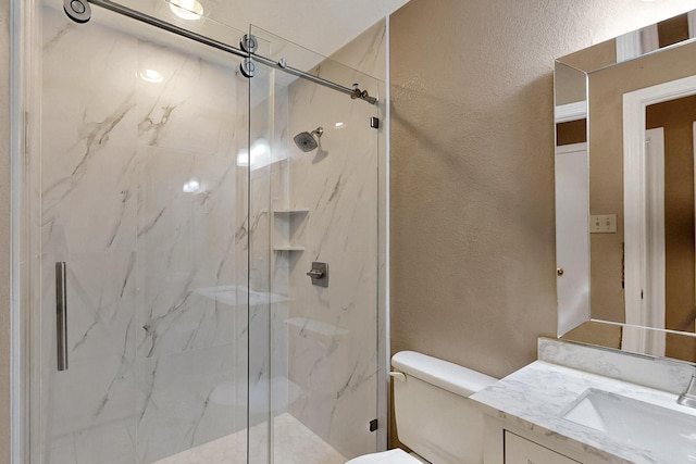 208 Lydia Cir, Irving, TX 75060 - full bath with a marble finish shower, a textured wall, toilet, and vanity