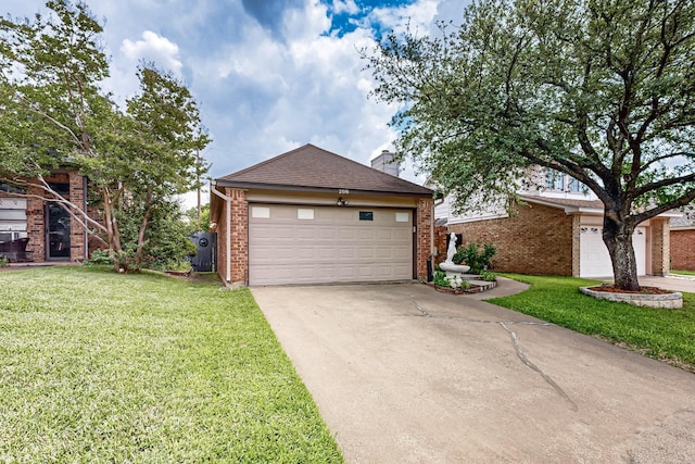 208 Lydia Cir, Irving, TX 75060 - view of front of property with concrete driveway, brick siding, a front lawn, and an attached garage