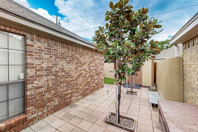 208 Lydia Cir, Irving, TX 75060 - view of patio / terrace featuring fence, an outdoor structure, and a storage shed