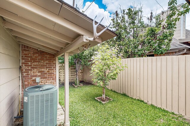 208 Lydia Cir, Irving, TX 75060 - view of yard featuring central air condition unit
