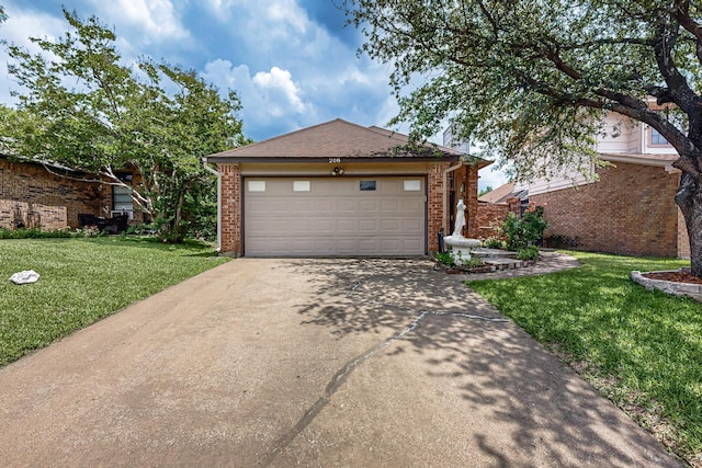 208 Lydia Cir, Irving, TX 75060 - view of front of house featuring a front yard, brick siding, and driveway