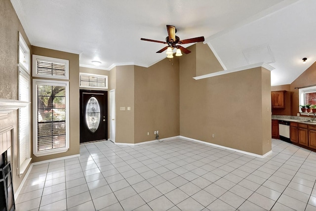 208 Lydia Cir, Irving, TX 75060 - entryway featuring ceiling fan, a high end fireplace, light tile patterned floors, lofted ceiling, and healthy amount of natural light