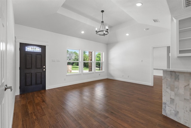 entryway with a chandelier, dark wood-style flooring, plenty of natural light, and recessed lighting