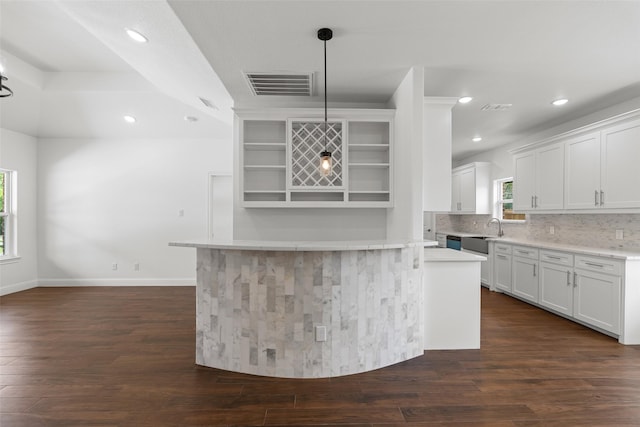 kitchen featuring open shelves, dark wood-style flooring, backsplash, light countertops, and recessed lighting