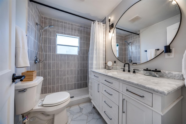 922 S Waverly Dr, Dallas, TX 75208 - full bathroom featuring toilet, tiled shower, marble look tile flooring, and vanity