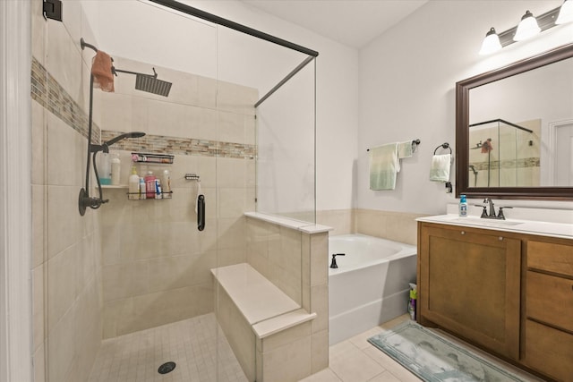 512 Navo Rd, Little Elm, TX 75068 - bathroom with a stall shower, a garden tub, vanity, and tile patterned floors