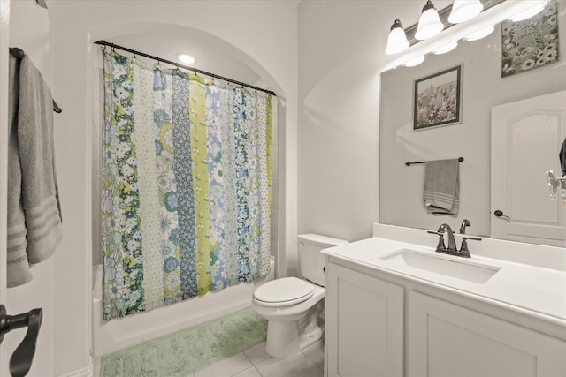 512 Navo Rd, Little Elm, TX 75068 - bathroom featuring vanity, toilet, shower / bath combo with shower curtain, and tile patterned flooring
