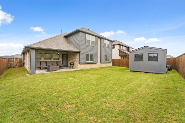 512 Navo Rd, Little Elm, TX 75068 - rear view of house with roof with shingles, a patio, and brick siding