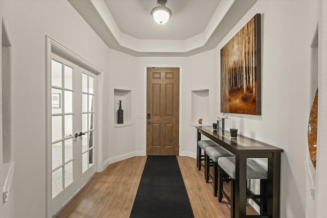512 Navo Rd, Little Elm, TX 75068 - entryway with french doors, light wood-type flooring, plenty of natural light, and a raised ceiling