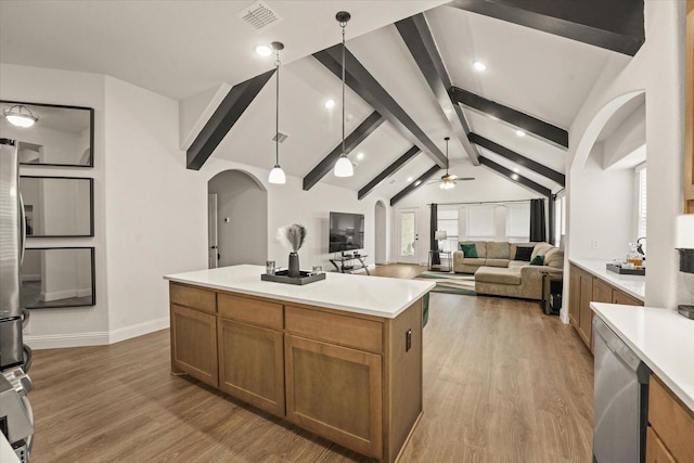 512 Navo Rd, Little Elm, TX 75068 - kitchen featuring arched walkways, stainless steel dishwasher, ceiling fan, light countertops, and recessed lighting