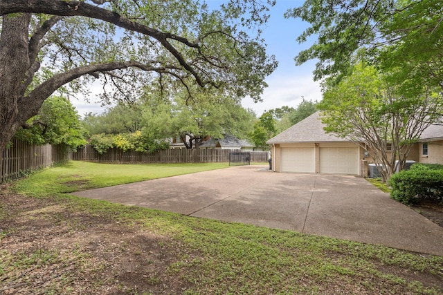 view of yard with a garage