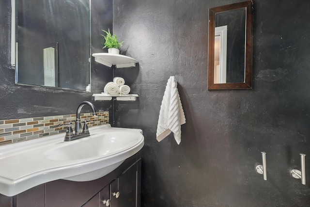 4816 Reynolds Rd, North Richland Hills, TX 76180 - bathroom featuring tasteful backsplash and vanity