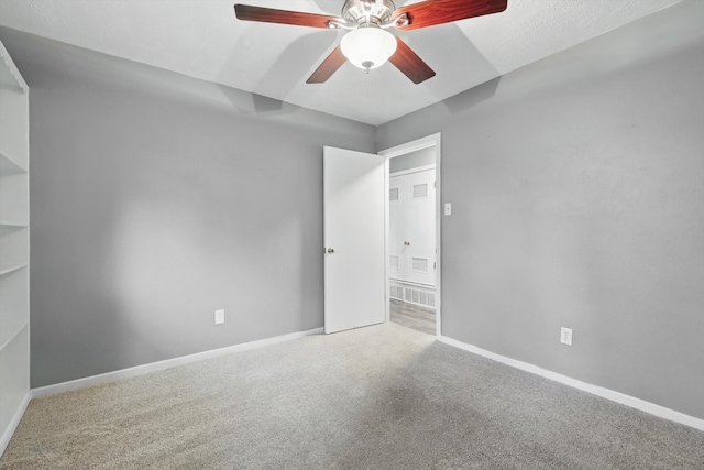 4816 Reynolds Rd, North Richland Hills, TX 76180 - carpeted empty room with a ceiling fan and baseboards