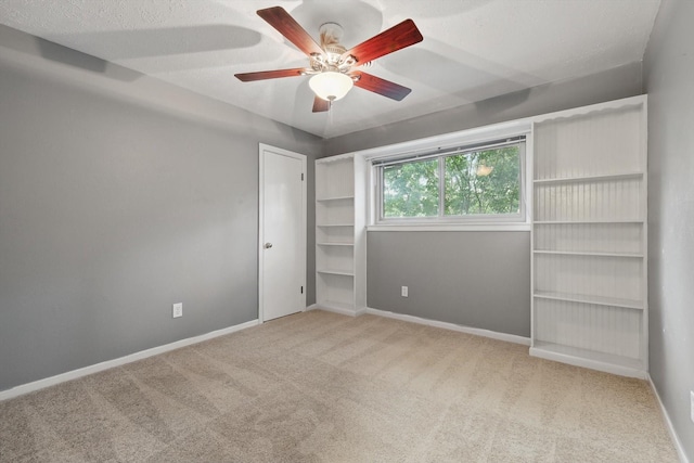4816 Reynolds Rd, North Richland Hills, TX 76180 - unfurnished bedroom featuring carpet floors, baseboards, and a ceiling fan