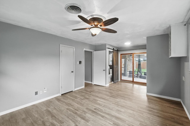 4816 Reynolds Rd, North Richland Hills, TX 76180 - unfurnished living room with ceiling fan, baseboards, and light wood-style floors