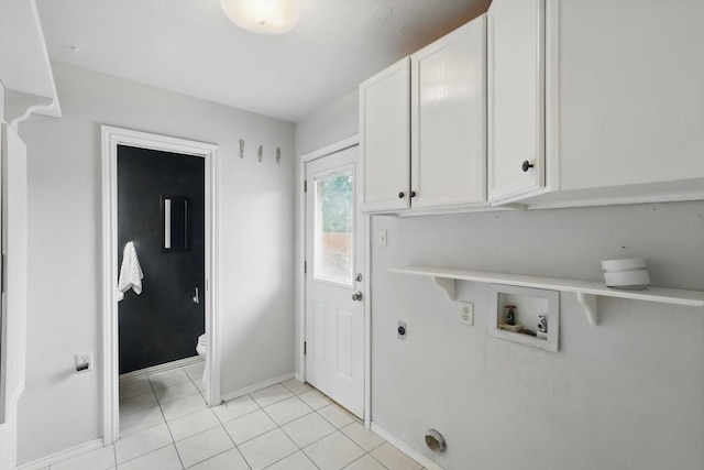 4816 Reynolds Rd, North Richland Hills, TX 76180 - washroom featuring cabinet space, electric dryer hookup, hookup for a washing machine, baseboards, and light tile patterned flooring