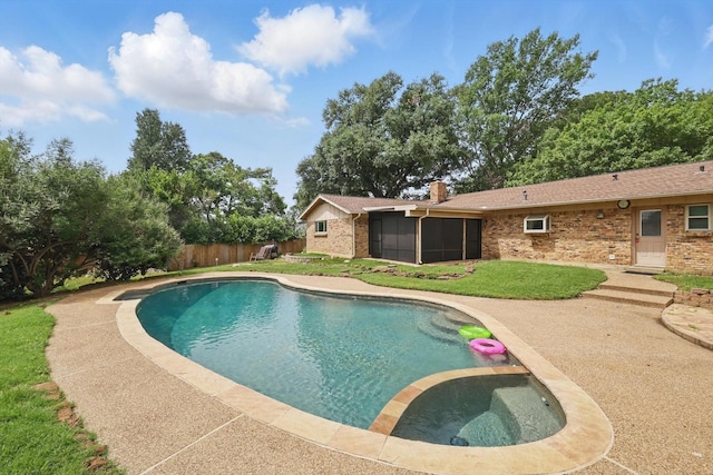 4816 Reynolds Rd, North Richland Hills, TX 76180 - view of pool with a sunroom, a pool with connected hot tub, and a patio