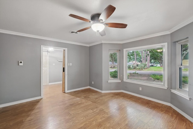 4816 Reynolds Rd, North Richland Hills, TX 76180 - unfurnished room featuring light wood-style flooring, ceiling fan, baseboards, and crown molding