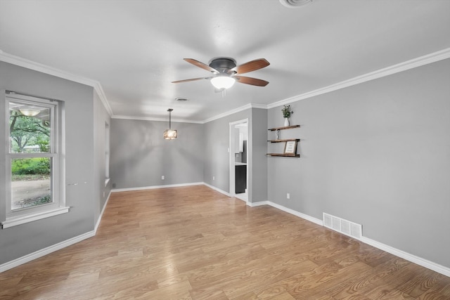 4816 Reynolds Rd, North Richland Hills, TX 76180 - unfurnished living room featuring ceiling fan, light wood-style floors, crown molding, and baseboards
