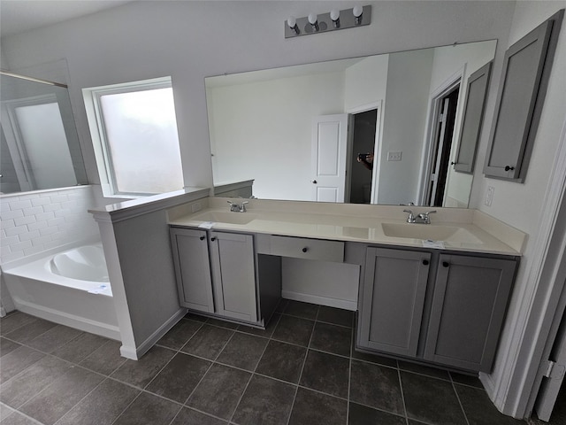 1710 Citrus Dr, Sherman, TX 75092 - bathroom with tile patterned flooring, double vanity, a garden tub, a shower, and baseboards