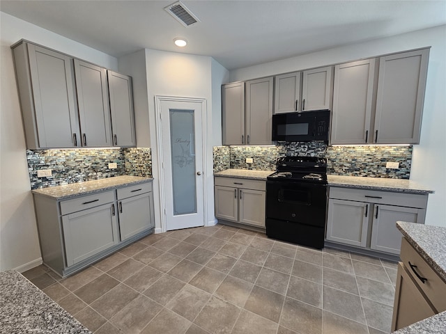 1710 Citrus Dr, Sherman, TX 75092 - kitchen featuring black appliances and gray cabinetry