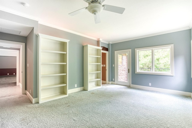 711 Pearl Cv, Oak Point, TX 75068 - unfurnished room featuring carpet flooring, crown molding, baseboards, ceiling fan, and a smoke detector