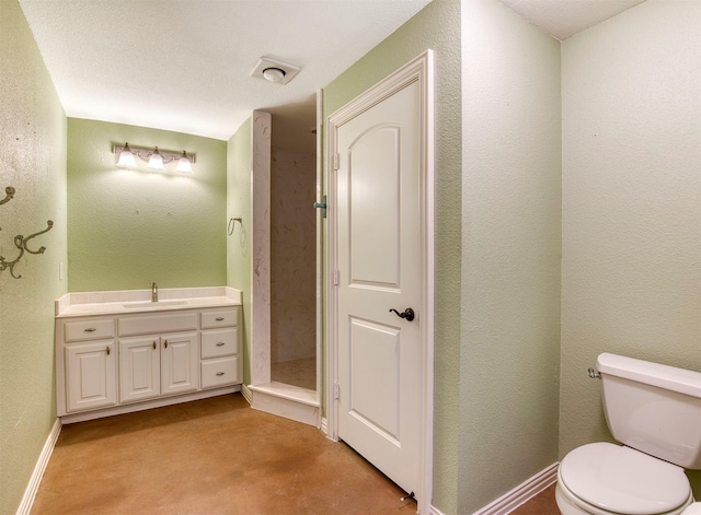 711 Pearl Cv, Oak Point, TX 75068 - bathroom featuring toilet, vanity, baseboards, and a textured wall