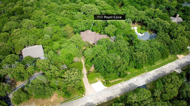 711 Pearl Cv, Oak Point, TX 75068 - aerial overview of property's location featuring a heavily wooded area