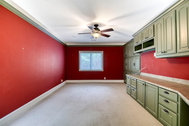 711 Pearl Cv, Oak Point, TX 75068 - kitchen featuring green cabinetry, a ceiling fan, baseboards, light colored carpet, and light countertops