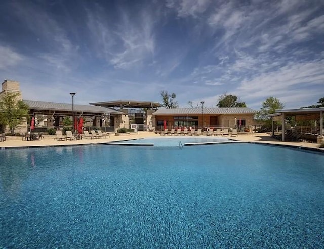 7804 Caddo Cv, Mckinney, TX 75071 - community pool with a patio area