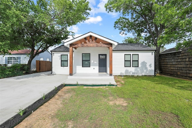 1608 Carolyn St, Irving, TX 75061 - view of front facade featuring covered porch and roof with shingles