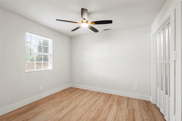 1608 Carolyn St, Irving, TX 75061 - unfurnished bedroom with light wood-type flooring, baseboards, a closet, and a ceiling fan