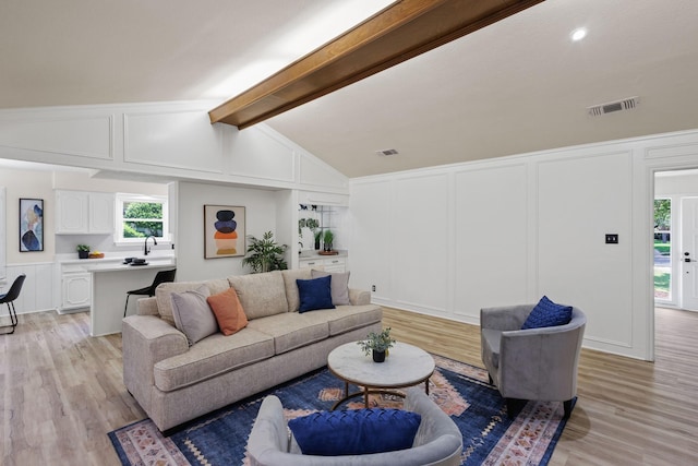 2809 Valley Ridge Dr, Richardson, TX 75080 - living area featuring a decorative wall and light wood-style flooring