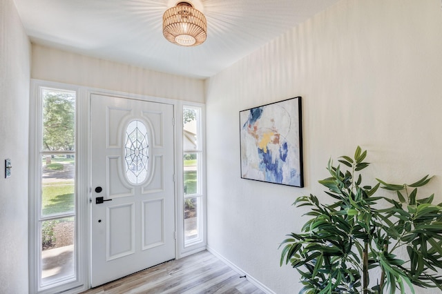 2809 Valley Ridge Dr, Richardson, TX 75080 - entryway featuring light wood finished floors and baseboards
