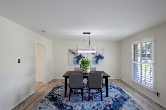 2809 Valley Ridge Dr, Richardson, TX 75080 - dining space featuring light wood finished floors and baseboards