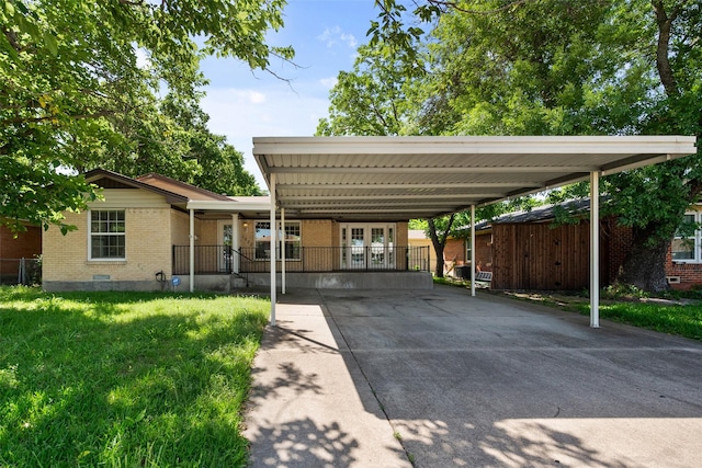 1622 Ridgeview St, Mesquite, TX 75149 - view of parking with french doors and driveway