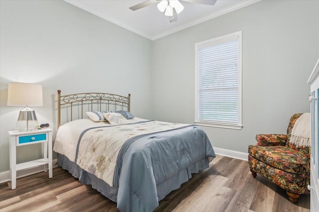 207 Merrifield Dr, Woodway, TX 76712 - bedroom with wood finished floors, crown molding, baseboards, and ceiling fan