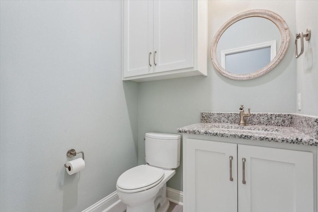 207 Merrifield Dr, Woodway, TX 76712 - bathroom with vanity, toilet, and baseboards