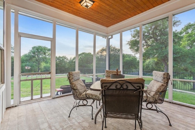 207 Merrifield Dr, Woodway, TX 76712 - sunroom / solarium with wood ceiling, outdoor dining area, wood finished floors, and healthy amount of natural light