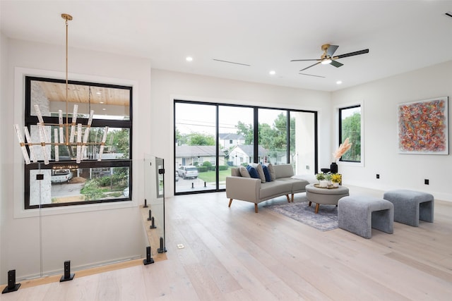 4326 Merrell Rd, Dallas, TX 75229 - living room featuring light wood finished floors, ceiling fan, and recessed lighting