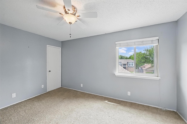 4841 Woodstock Dr, Fort Worth, TX 76137 - carpeted spare room featuring ceiling fan, a textured ceiling, and baseboards