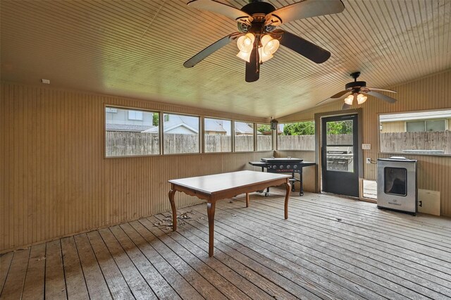 4841 Woodstock Dr, Fort Worth, TX 76137 - playroom featuring wood-type flooring, healthy amount of natural light, ceiling fan, and wood walls