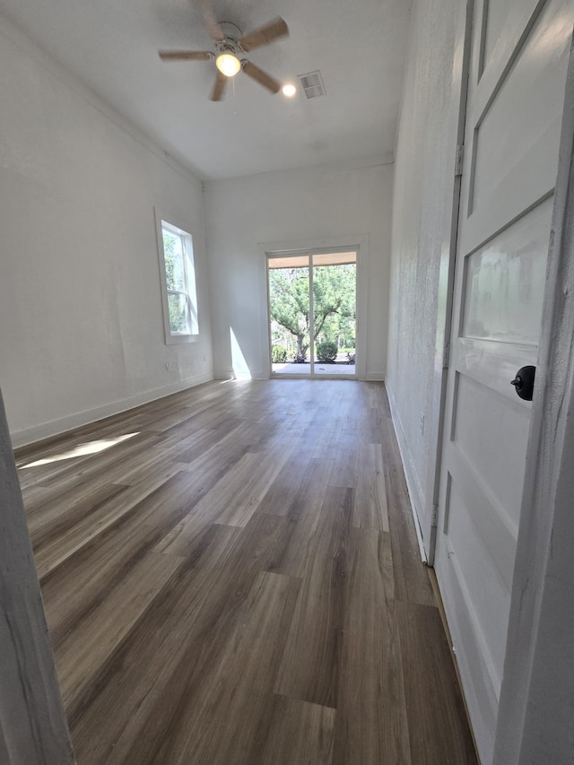 109 Anderson Ln, Mabank, TX 75156 - empty room with wood finished floors, a ceiling fan, and baseboards