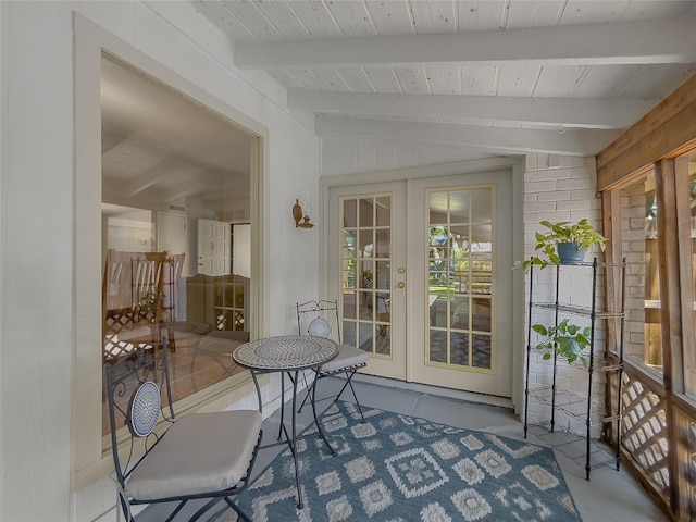sunroom featuring french doors