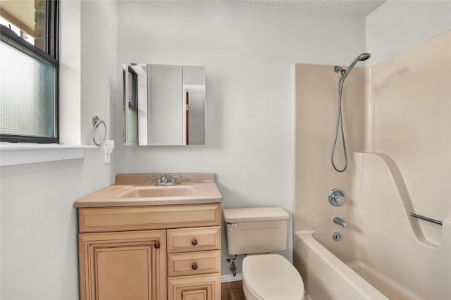 1208 Kay Dr, Weatherford, TX 76086 - full bathroom featuring vanity, toilet, and washtub / shower combination