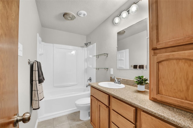 1208 Kay Dr, Weatherford, TX 76086 - full bathroom featuring vanity, tile patterned floors, shower / bathtub combination, toilet, and a textured ceiling