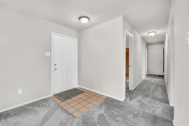 1208 Kay Dr, Weatherford, TX 76086 - entrance foyer with carpet flooring, baseboards, and tile patterned flooring