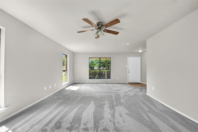 1208 Kay Dr, Weatherford, TX 76086 - carpeted empty room featuring ceiling fan and baseboards